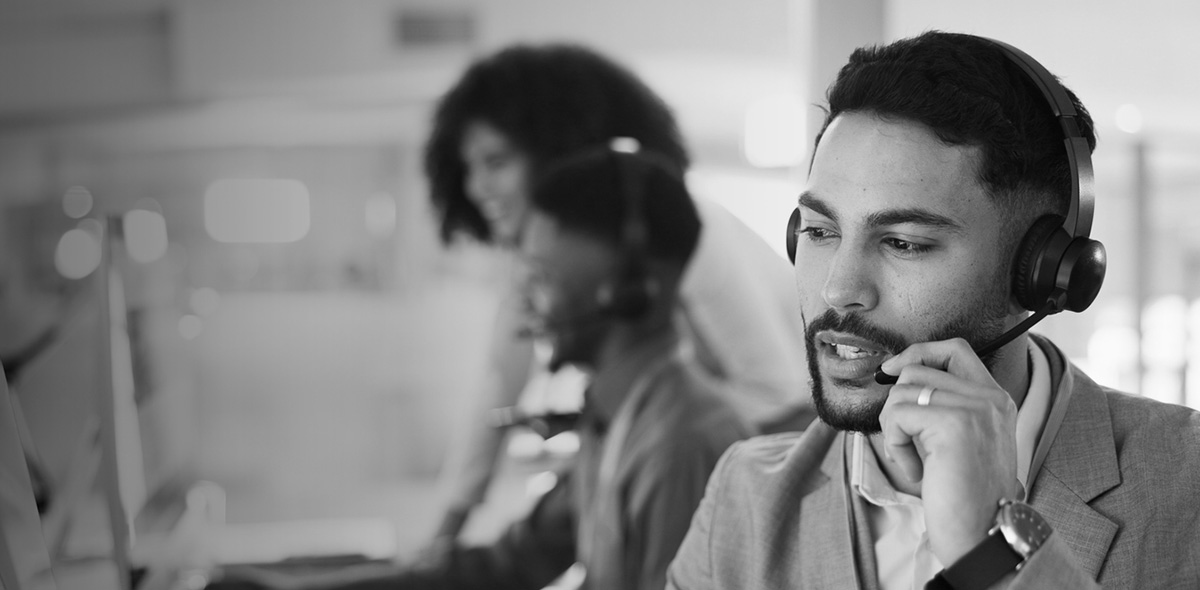 Healthcare RCM professionals on the phone with a client